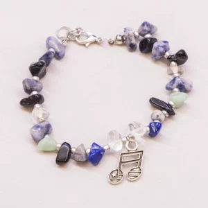 Natuurstenen armband in blauwtinten met muzieknoot bedel
