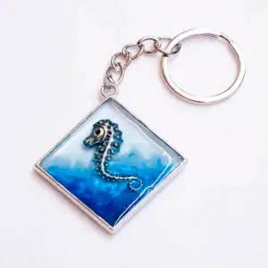 Sleutelhanger met zeepaardje in blauwe tinten